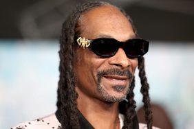 Closeup of rapper Snoop Dogg smiling collaboration with Petco