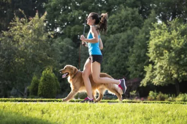 jogger exercising with dog